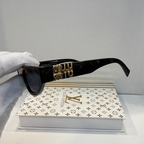 Miu Miu MU 11WS